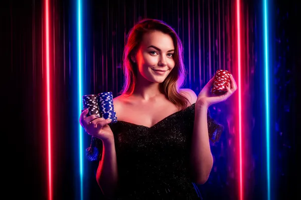 BK33B Games — Discover modern slots and table adventures A man celebrating a winning moment on his laptop while gaming symbols float around him, capturing the excitement of BK33B games.